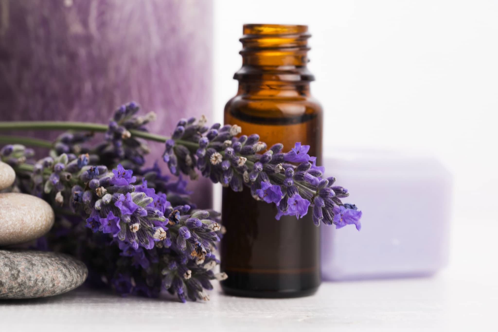 Lavender flowers with lavender bathing oils.