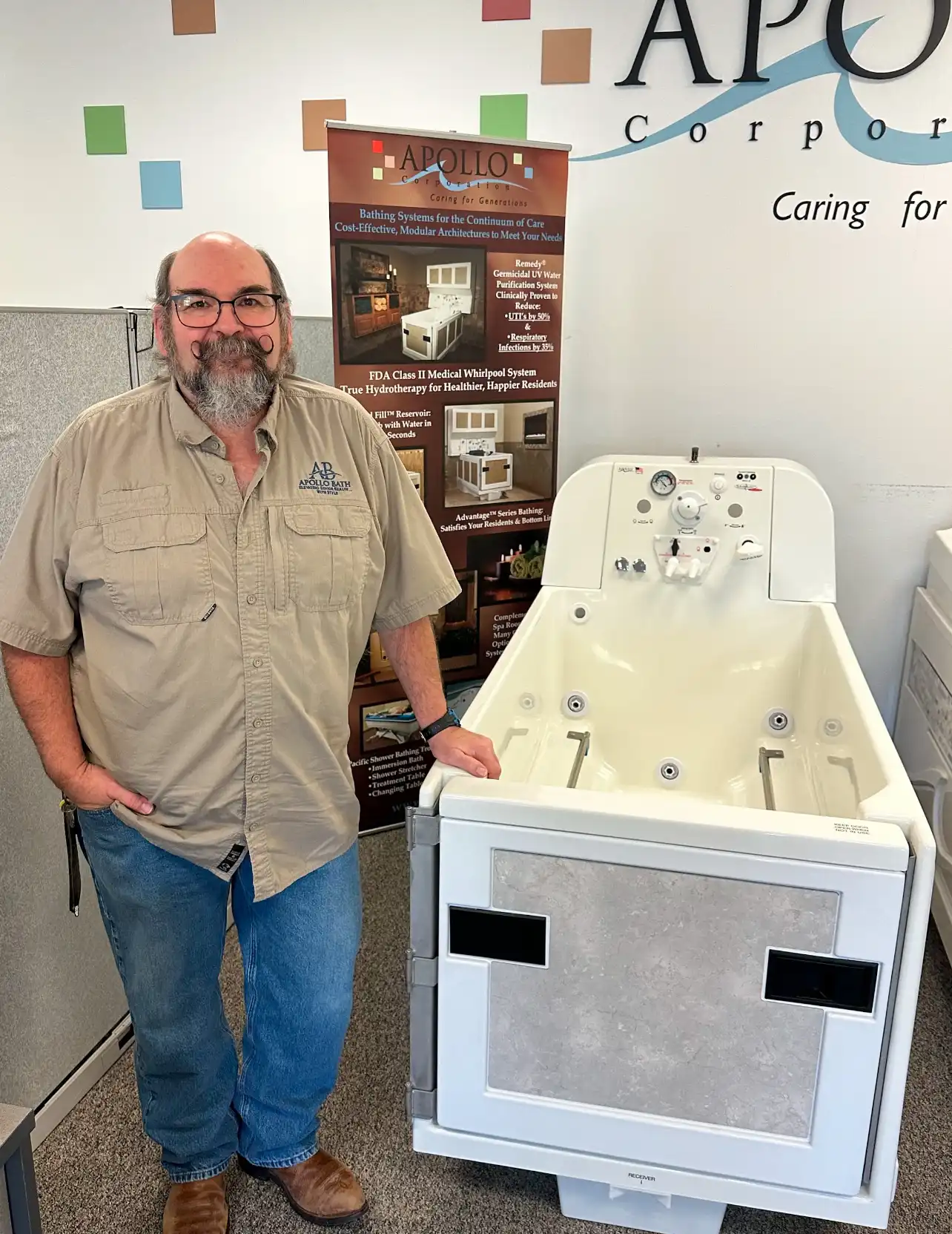 Our Team 3 Apollo Bath team member showcasing Apollo walk-in tub with hydrotherapy features for elderly bathing solutions